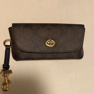 Coach Black sunglasses case
with Gold Turnlock